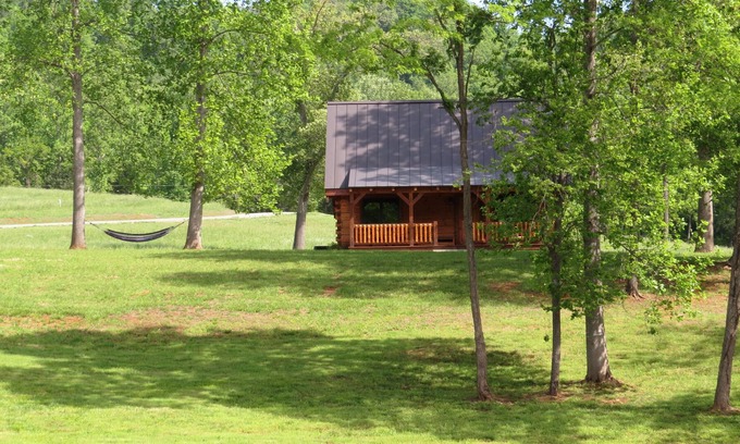 Faber Cabin | Luxurious Log Cabin On 200 Acres Overlooking Private Lake.