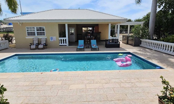 Juba Sound Cottage | Luxurious Private Cottage With Pool, Luscious Garden Views, And Refined Comfort.