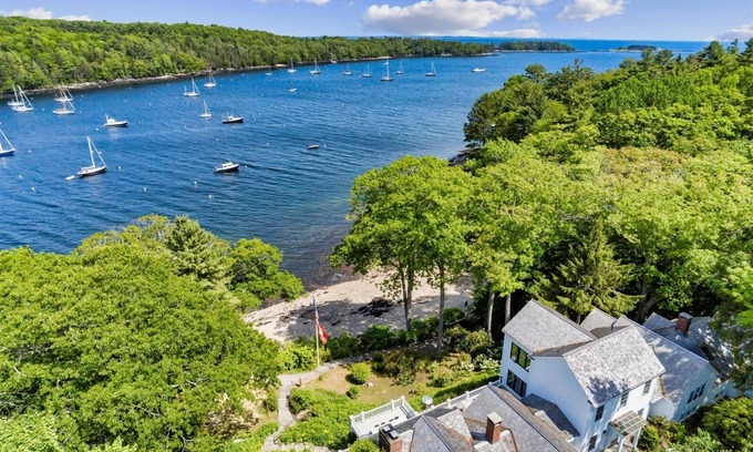Camden House | Luxurious Rockport Harbor Oceanfront Home With Private Sandy Beach and Dock