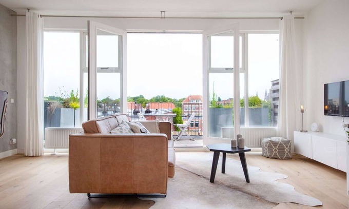 Groningen Apartment | Luxurious rooftop penthouse with rooftop terrace, a balcony, bath, duo shower
