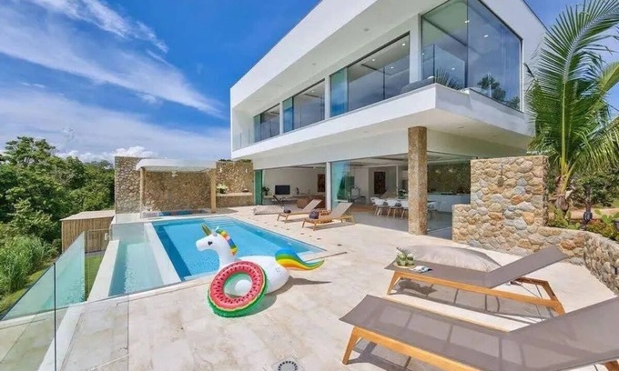 Moo 5 Villa | Luxurious 4-bedroom villa with infinity pool, private cinema, gym, and stunning sea views