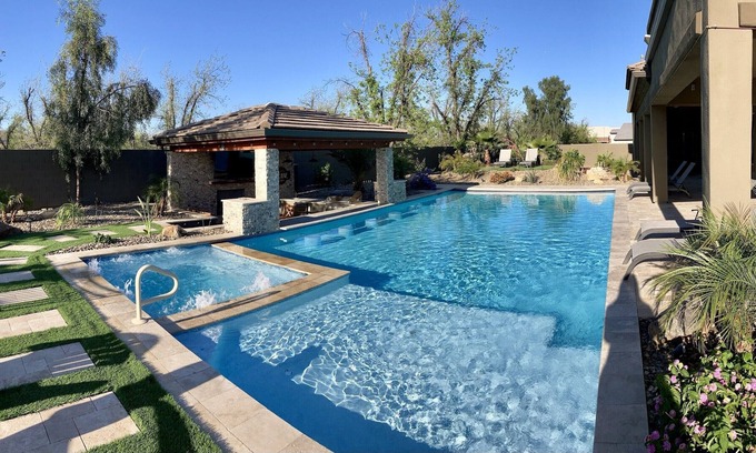 Queen Creek House | Luxury 4 BR, pool/spa w/ swim up bar, mist system, putting greens, pool table.