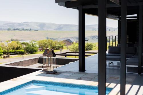 Cathkin Park House | Luxury 4BR Drakensberg Home Private Pool and Braai