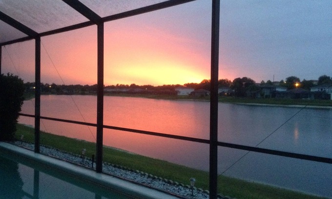 Sunset Lakes Villa | Luxury 5BR/3.5BA Villa, 2 Masters - Lakeside Pool & Games Room.