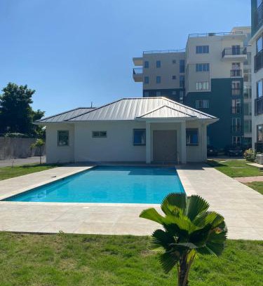 Eden Gardens Apartment | Luxury and Cozy Oasis w 24hrs Pool access at The Vineyard Kingston
