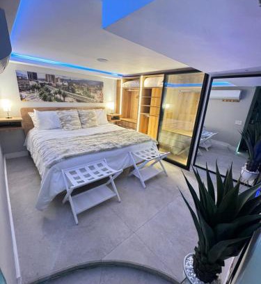 Medellin Apartment | Luxury Apartment Jacuzzi Air Conditioning Fireplace and King Bed
