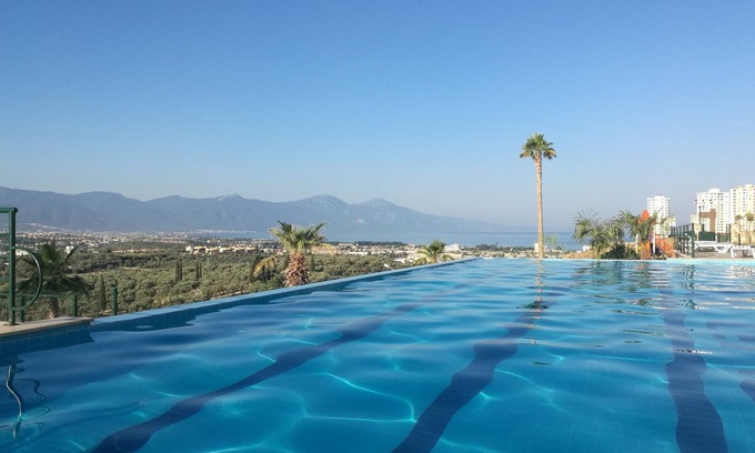 Kusadasi Apartment | Luxury apartment with unobstructed views of the sea and the national park