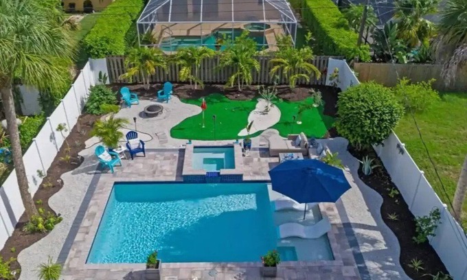 Naples Park House | Luxury Beach House Pool & Hot Tub Oasis