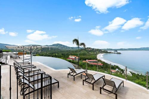 Playa Flamingo House | Luxury Condo with Panoramic Ocean Views, Sparkling Infinity Pool, and Modern Open-Concept Design
