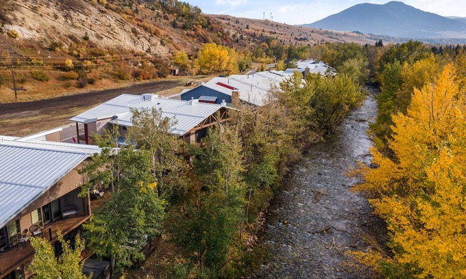 Red Lodge House | Luxury creek side cabin with 4 master bedrooms & 1000 feet of creek side decks