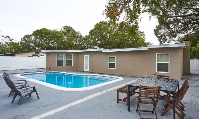 Sun Bay South House | Luxury Dream Getaway: Heated Pool House in Prime Location!