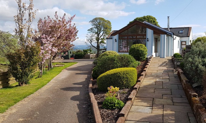 Lochmaben Cottage | Luxury Farm Cottage - Garden, Games/Sun Lounge Patio with furniture
