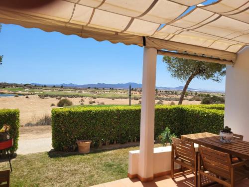 Alhama de Murcia Apartment | Luxury Ground Floor Apartment at Golf Resort Condado de Alhama with Private Garden & Pools