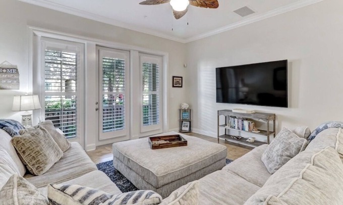 American Beach Condo | Luxury ground level condo. Golf cart, bikes, included.