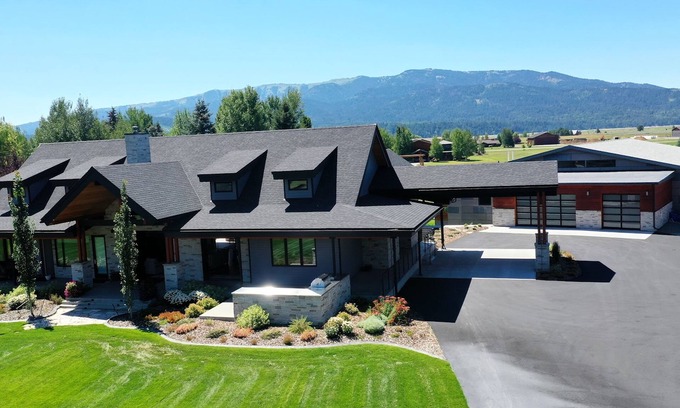 Alpine Northwest House | Luxury Home with outdoor dining, fitness room and Mountain Views