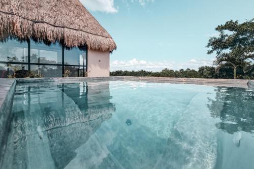 Chemuyil Apartment | Luxury Jungle Penthouse with Private Rooftop Pool