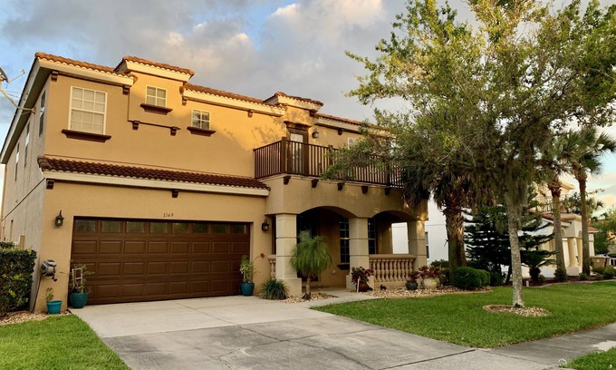 Buena Ventura Lakes House | Luxury Lake Home near parks and MCO airport. Private Pool and spa. Themed rooms.