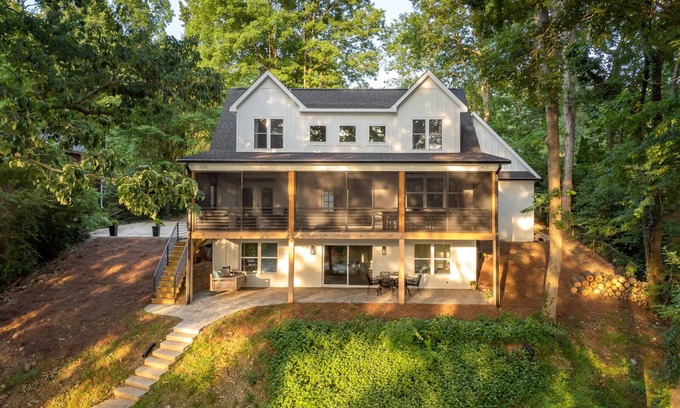 Florence House | Luxury Lakefront home with gorgeous views, screened patio, firepit, & boat dock