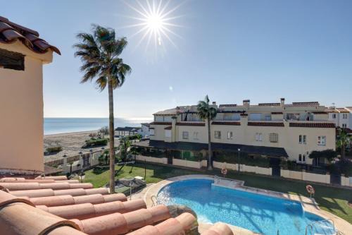Marina de Casares House | Luxury modern beachfront 3 bed gated community townhouse with pool, sun terrace, sea views close to all amenities