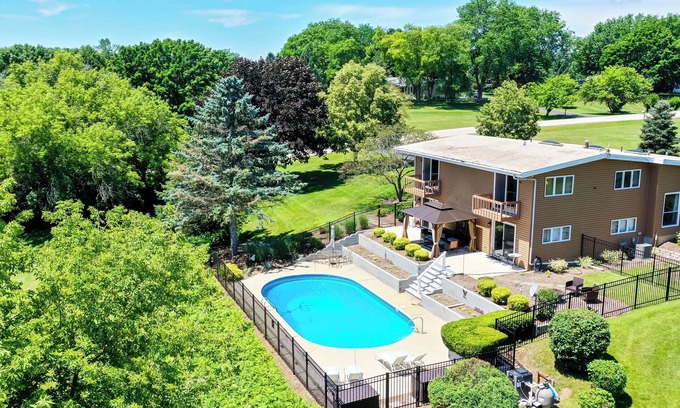 McHenry House | Luxury Moraine Hills Home w/heated Pool and Sauna — Up to 10 Guests!
