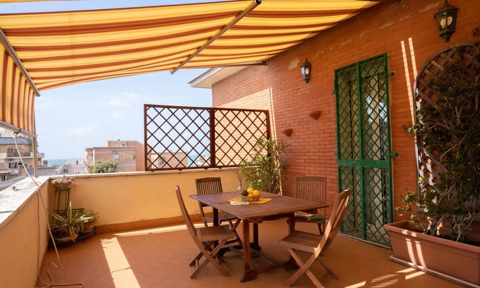 Quartiere XXXIII Lido di Ostia Ponente Apartment | Luxury penthouse overlooking the sea at Lido di Roma.
