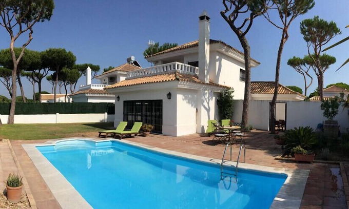Nuevo Portil Villa | Luxury Private Villa with private swimming pool, courtyard and gardens.