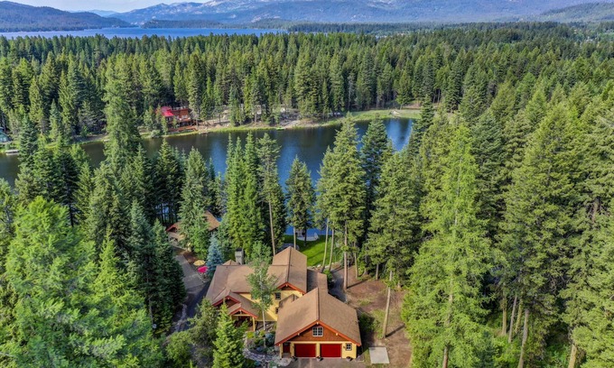 McCall House | Luxury Retreat w/Guest House on Secluded Pond w/TOYS - Kayaks, SUP's, & Canoe | EV Charger