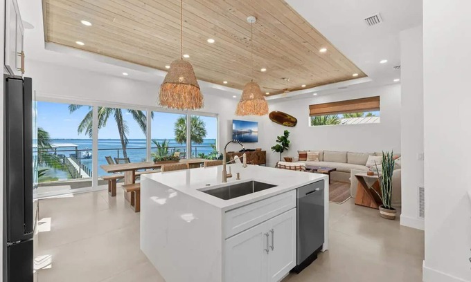 Tropic Apartment | Luxury River front Home/Resort steps to the Beachnn