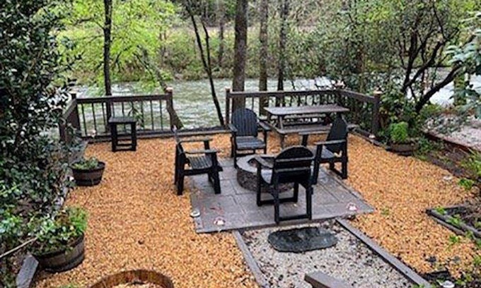 East Ellijay Apartment | Luxury Riverfront Getaway with Fire Pit and Private Deck