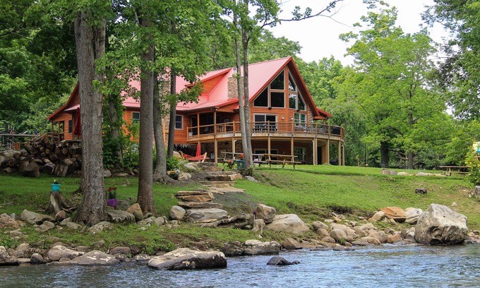 Friendsville Cabin | Luxury Riverfront Lodge sleeps 25 w/Heated Pool, Great for Family Reunions