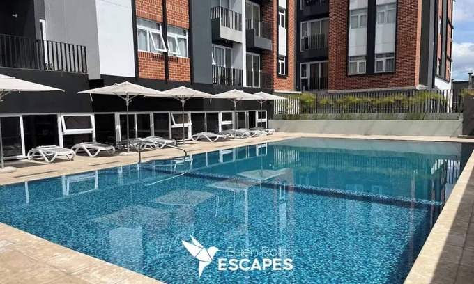 Zona 11 Apartment | Luxury Skyline Volcano View KING Bed FREE Pool Gym