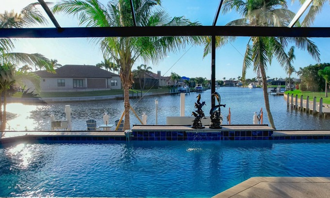 Burnt Store Isles House | Luxury Tropical long waterfront view w/bikes,kayaks,golf clubs,beach gear incl.