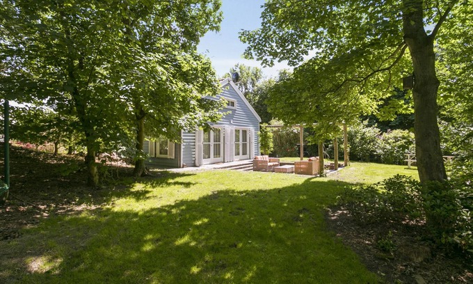 Ouddorp House | Luxury vacation home with sweeping views adjacent to nature reserve, beach and dunes within walking distance.