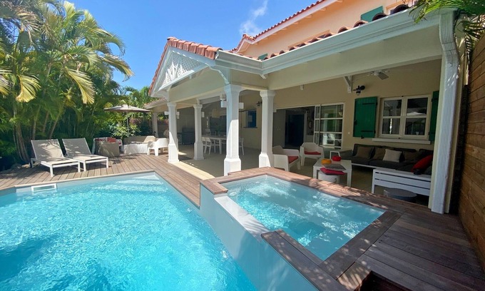 Saint-Francois Villa | LUXURY VILLA CHAMPAGNE 9 people between the lagoon with its beach and the golf course