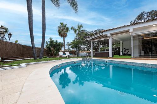 Puerto de la Cruz Ski Chalet | Luxury Villa with Heated Pool, Jacuzzi, Gym, and Gardens