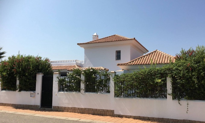 El Portil Villa | Luxury villa with private pool overlooking golf course, close to beach