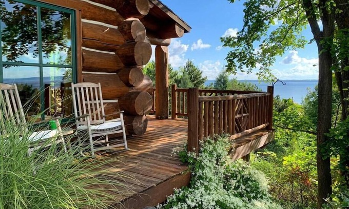 Suttons Bay House | Luxury Waterfront Log Home 15 min from Traverse City w/Dock