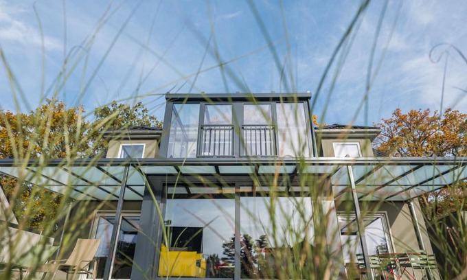 Krakow am See Apartment | Luxus FeWo 112m² direkt am Wasser inkl. Boot
