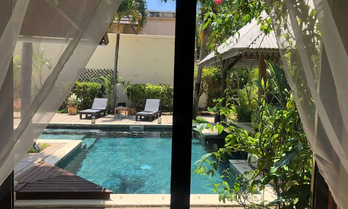 Pereybere Villa | Magnificent holiday villa nestled in a tropical garden, not overlooked.