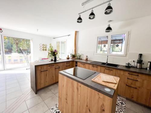 Mios House | Maison en lisière de forêt