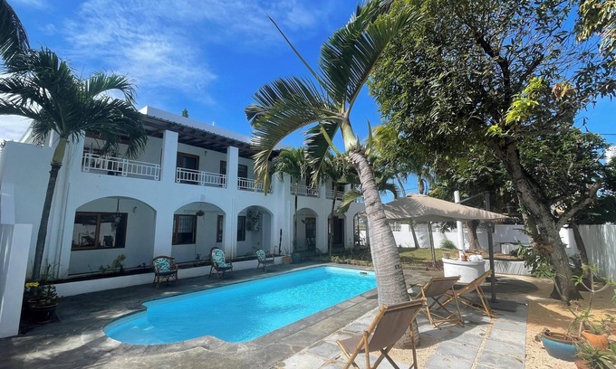 Blue Bay Apartment | Malcolm, 4 bedroom apartment within walking distance of Blue Bay lagoon!