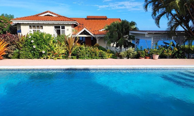 Bacolet House | Malindi Villa is located on a cool quiet hill at Bacolet Point