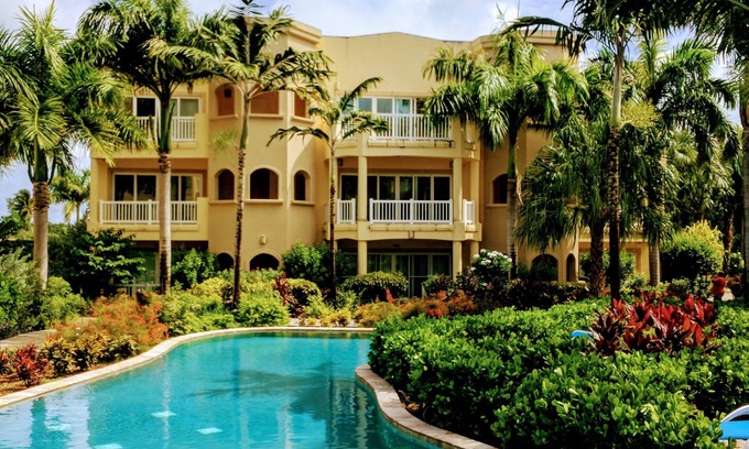 Cotton Ground Condo | “Mango” - Vibrant Condo Yards from BEACH at Hamilton Beach Villas & Spa