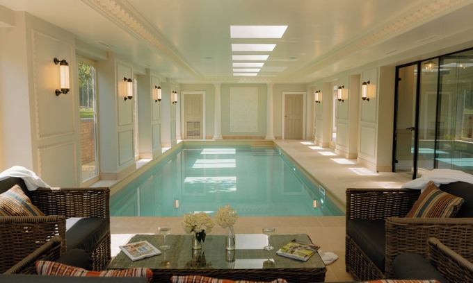 Malpas House | Manor home sleeping 18 guests , indoor pool, spa suite, hot tub, cinema room, outdoor kitchen & bar