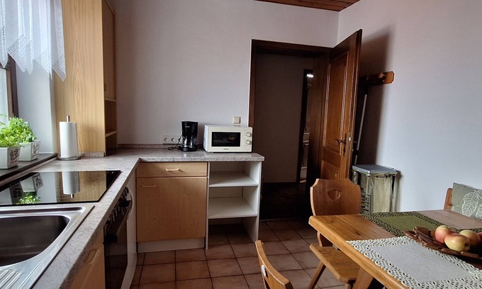 Laufen Apartment | Mansarden-wohnung 38m² mit Bergblick, bis 4 Personen, 2 Balkone