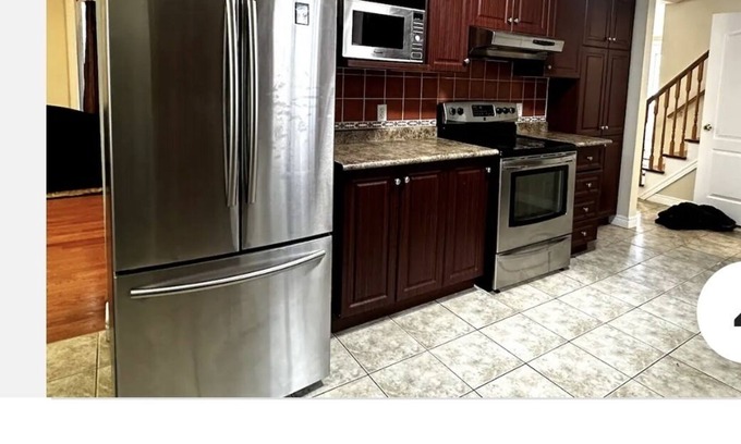 Guelph House | Master Bedroom with ensuite Bathroom & Closet. Kitchen and living are shared.
