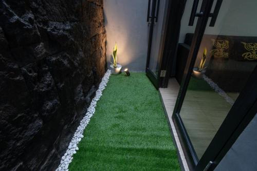 Renon Apartment | Mezzanine Luxury Smart Room - Sanur