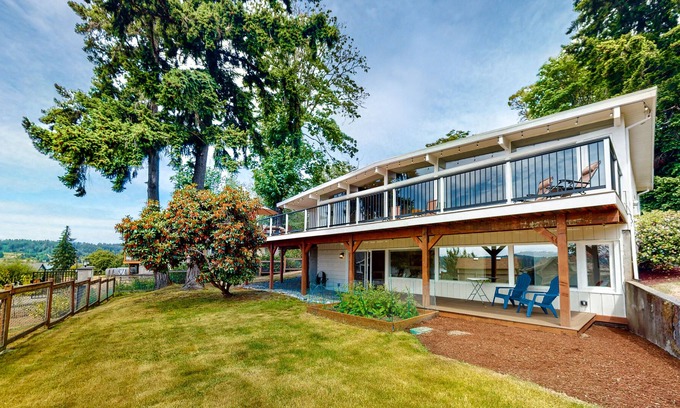 Poulsbo House | Mid-century home with stunning bay & mountain views, wraparound deck