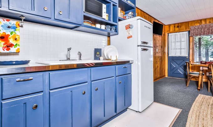 Presque Isle House | Mid-century, lakefront suite with lake view, communal dock, rowboats & firepit