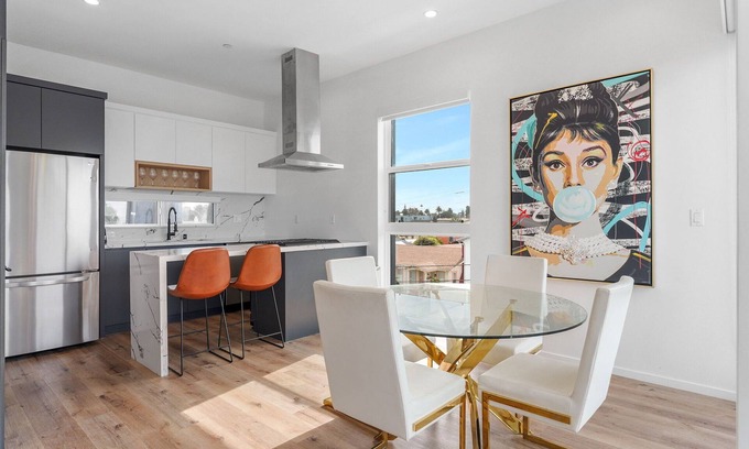 Tri-West Apartment | MidCity 3BR/2BA Townhome with Rooftop, 5 Beds & 2-Car Parking